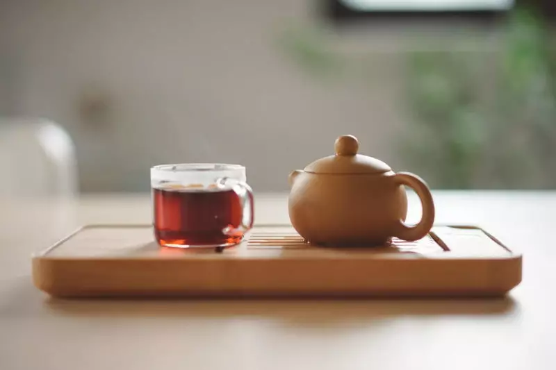 tea pot with a cup
